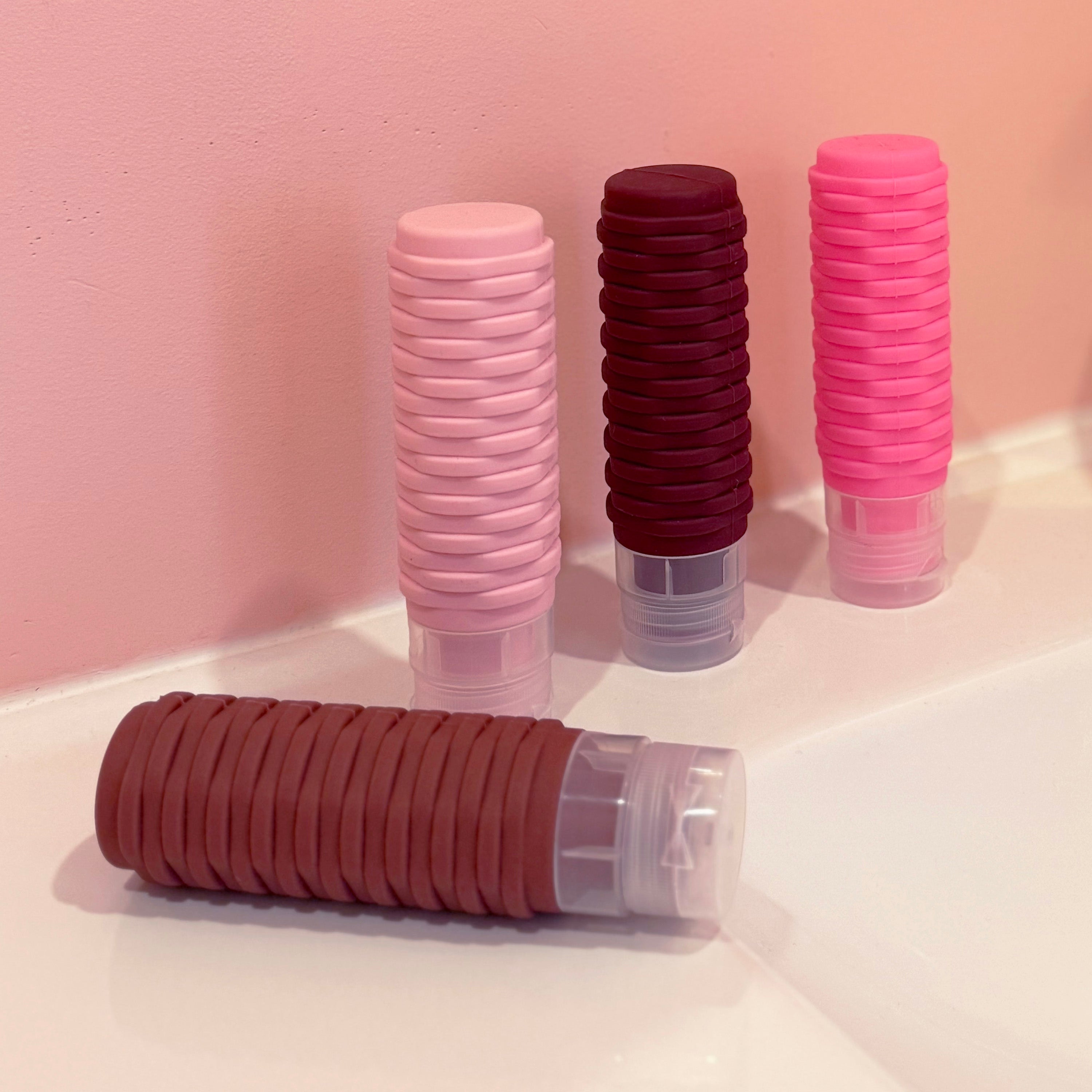 SET OF 4 SILICONE TRAVEL BOTTLES