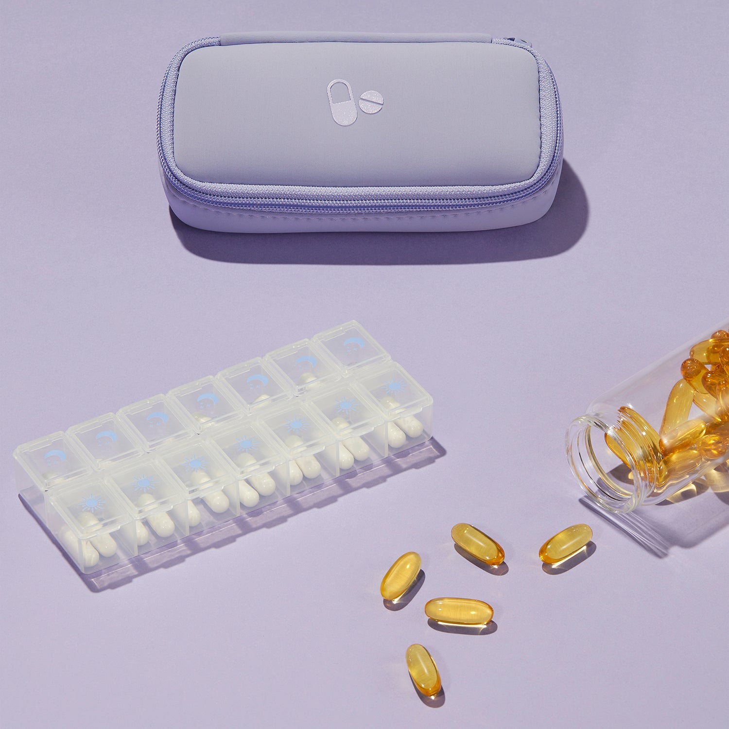 Lilac 7 day vitamin organizer with clear plastic insert.